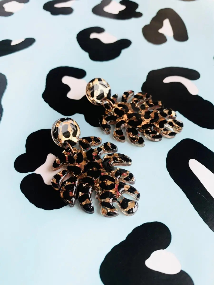 Gold Glitter Leopard Print Monstera Leaf Dangle Earrings from Sapphire Frills