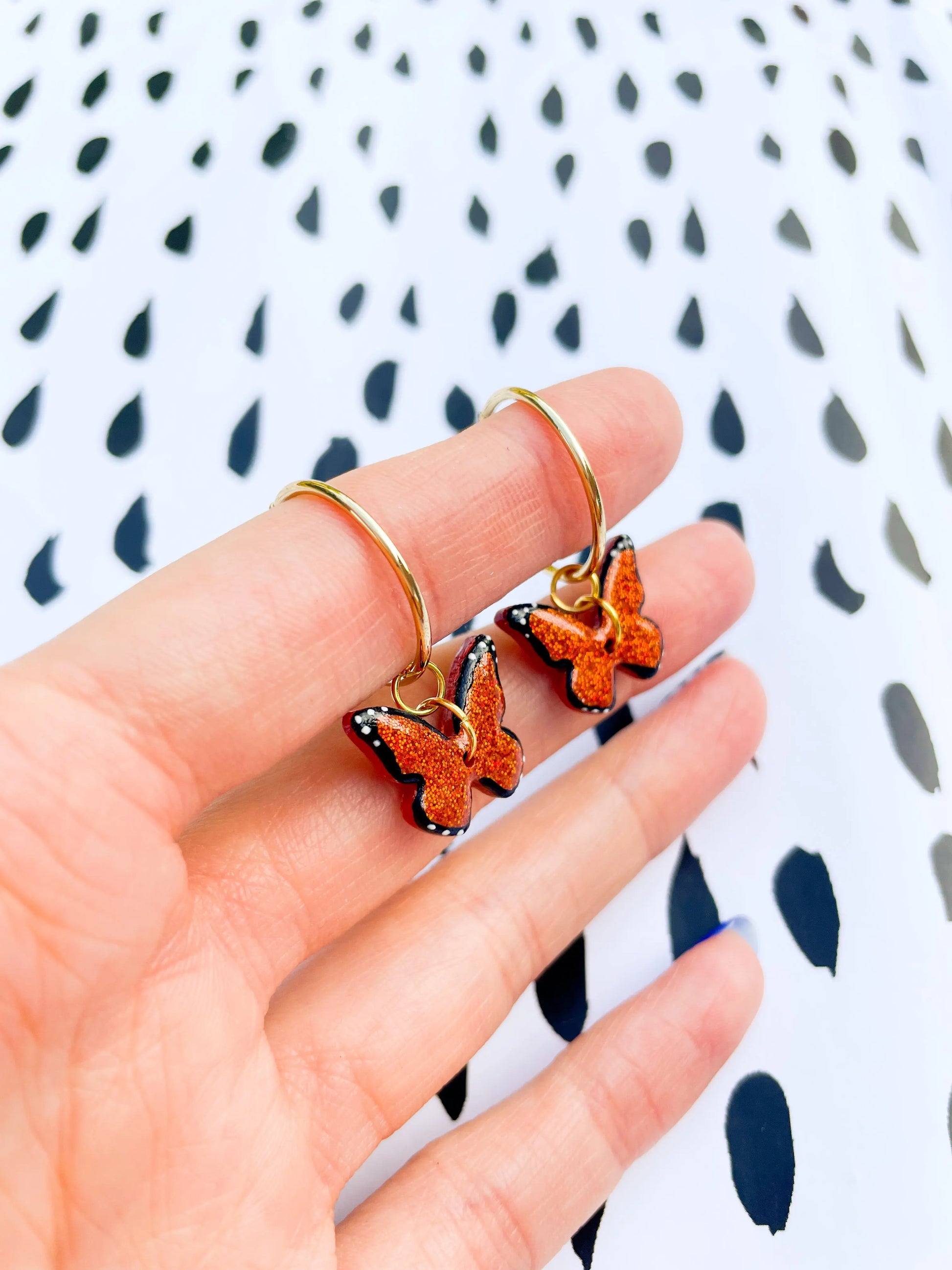 Medium Burnt Orange Glitter Butterfly Dangle Earrings from Sapphire Frills