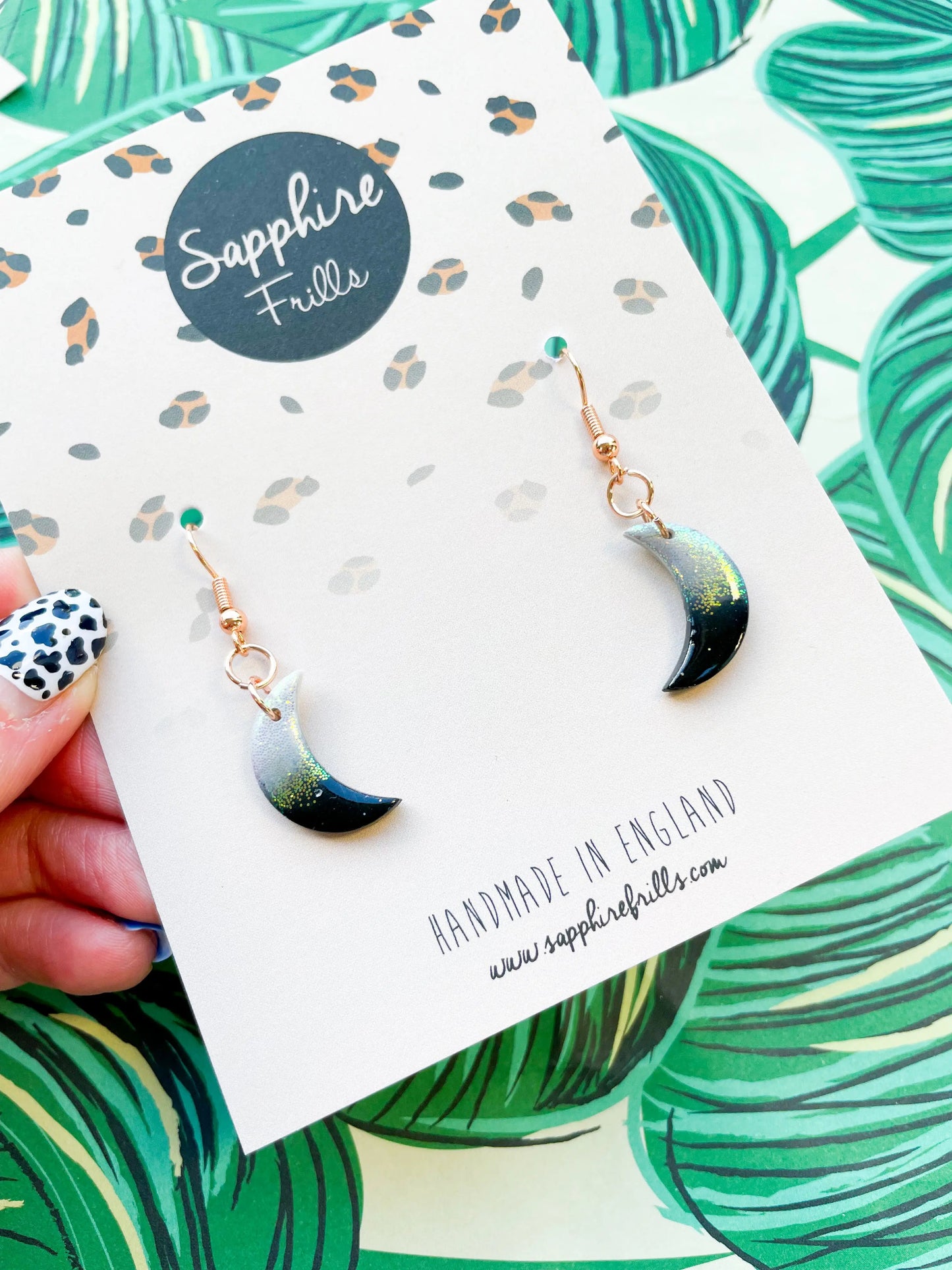 Medium Florescent White Glitter and Black Ombre Moon Earrings from Sapphire Frills