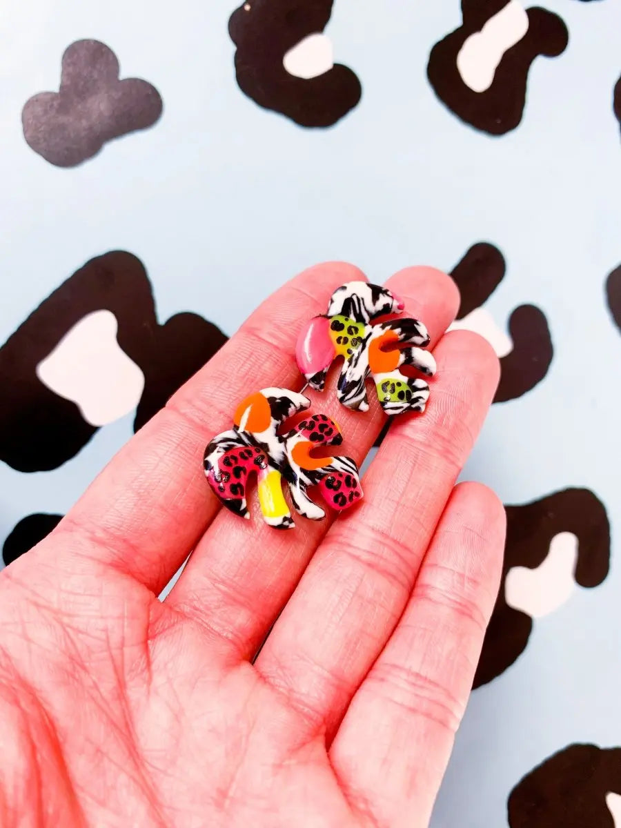Medium Funfair Neon Jungle Leopard Monstera Leaf Earrings from Sapphire Frills