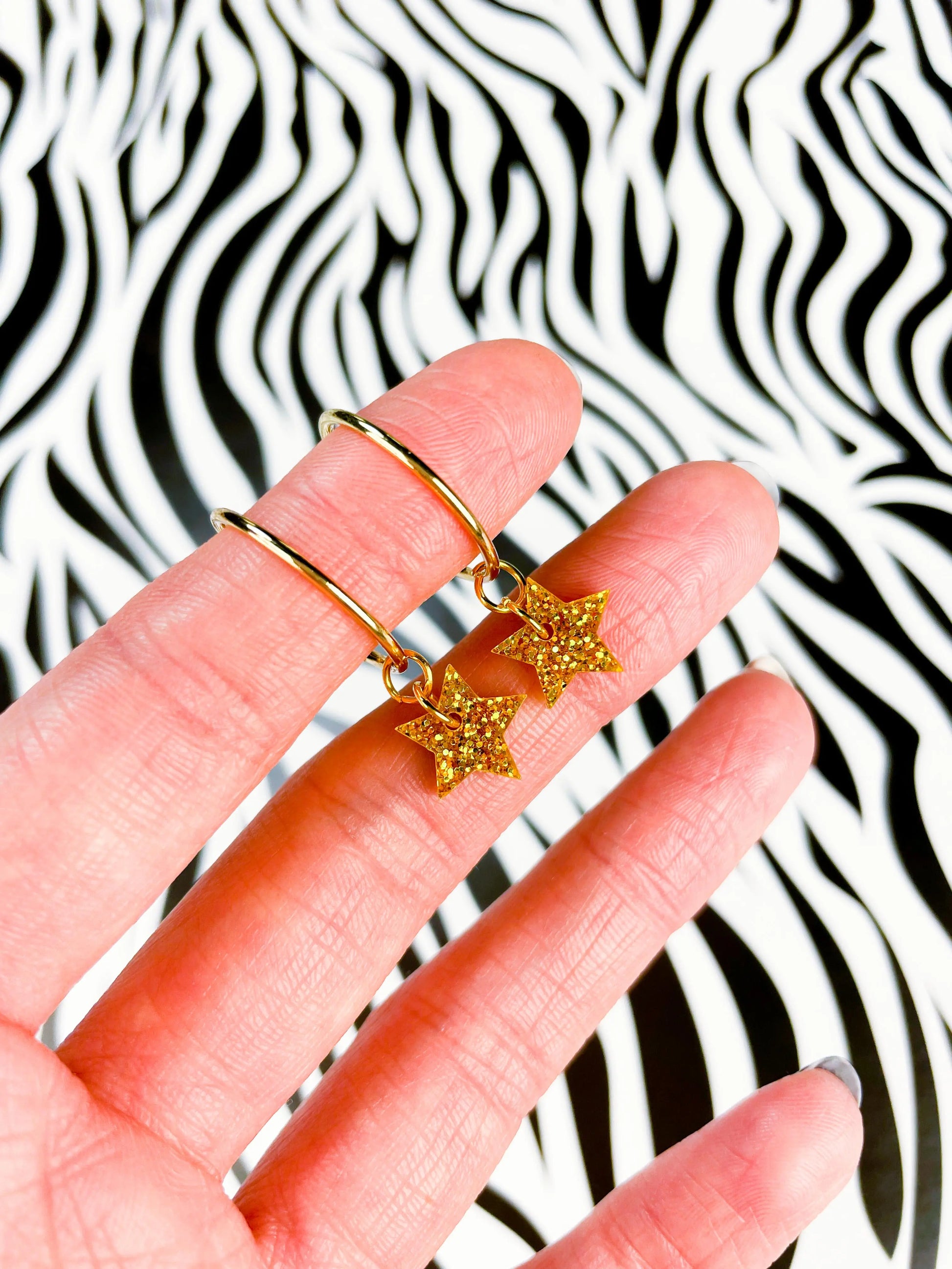 Mini Gold Glitter Acrylic Star Dangle Earrings from Sapphire Frills