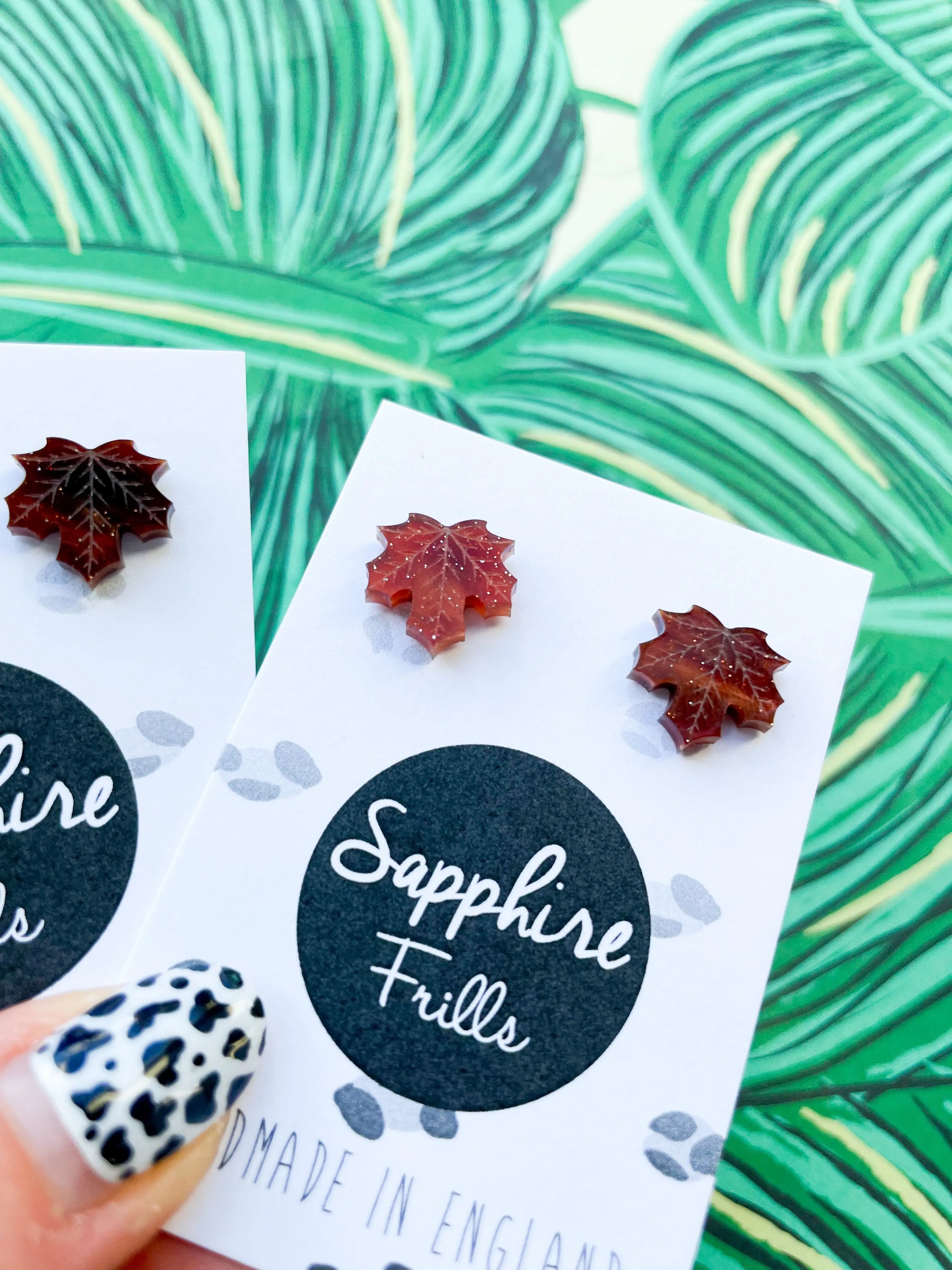 Mini Maroon Glitter Marble Acrylic Maple Leaf Stud Earrings from Sapphire Frills