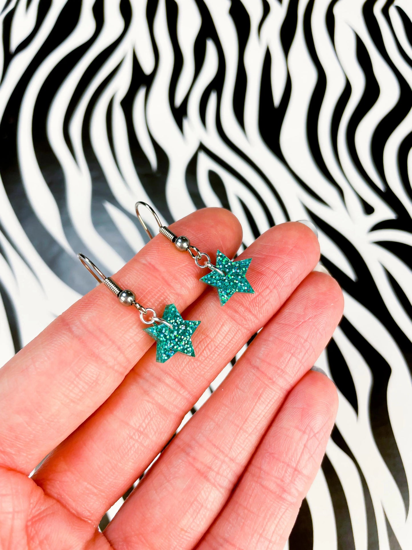Mini Teal Luxe Glitter Acrylic Star Dangle Earrings from Sapphire Frills