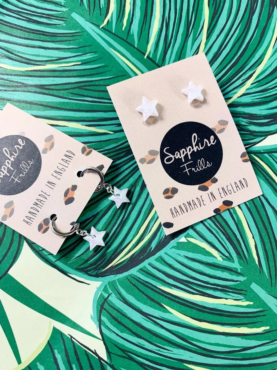 Mini White Florescent Glitter Star Stud Earrings from Sapphire Frills