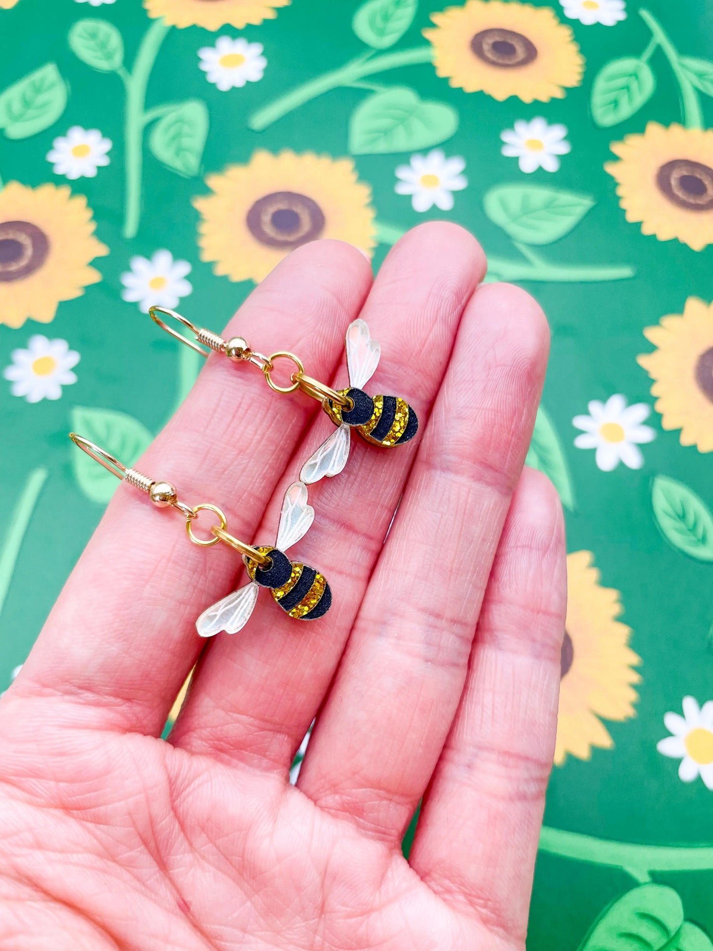 Small Gold Glitter and Iridescent Blue Acrylic Bee Dangle Earrings from Sapphire Frills