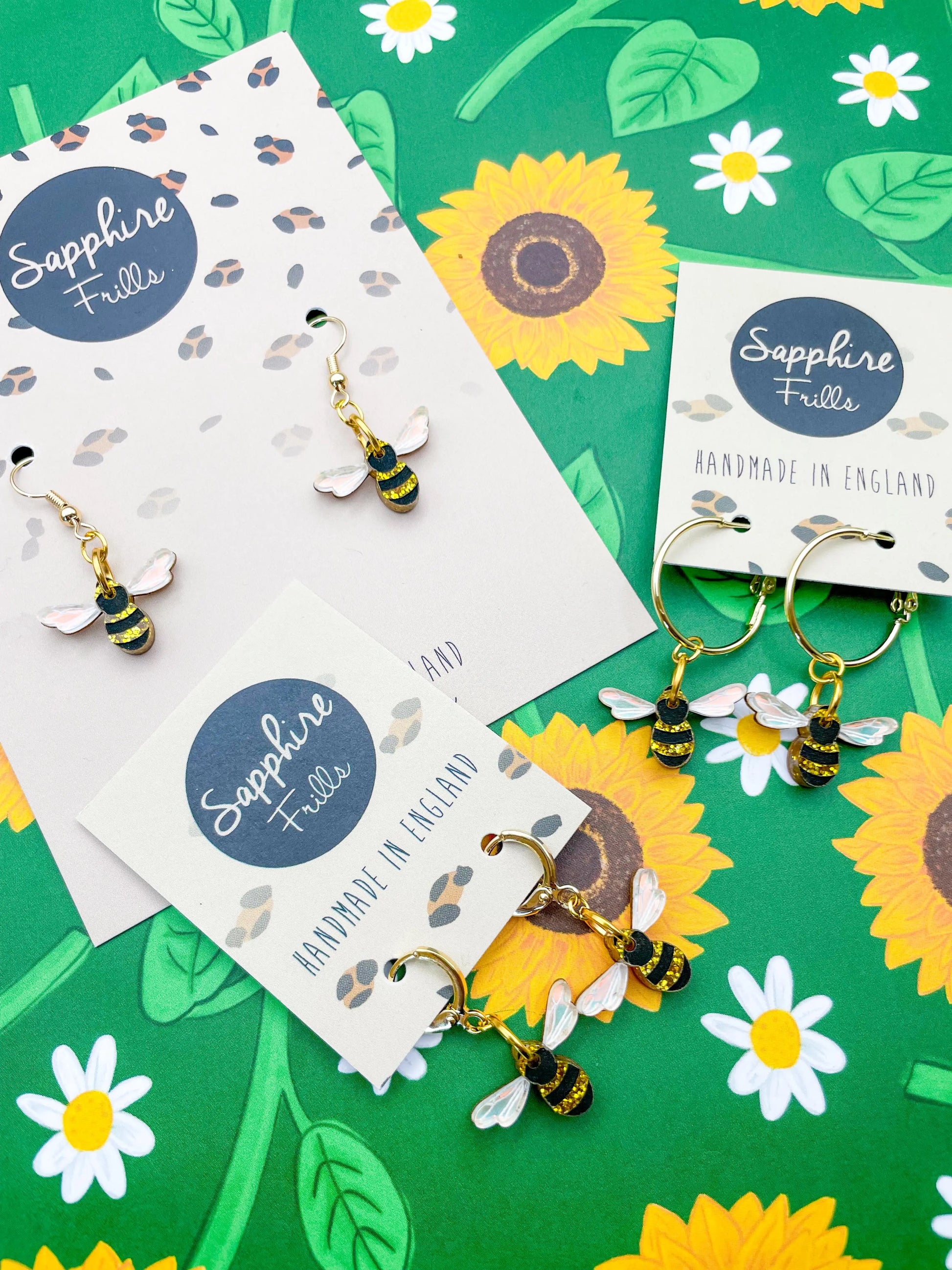 Small Gold Glitter and Iridescent Blue Acrylic Bee Dangle Earrings from Sapphire Frills