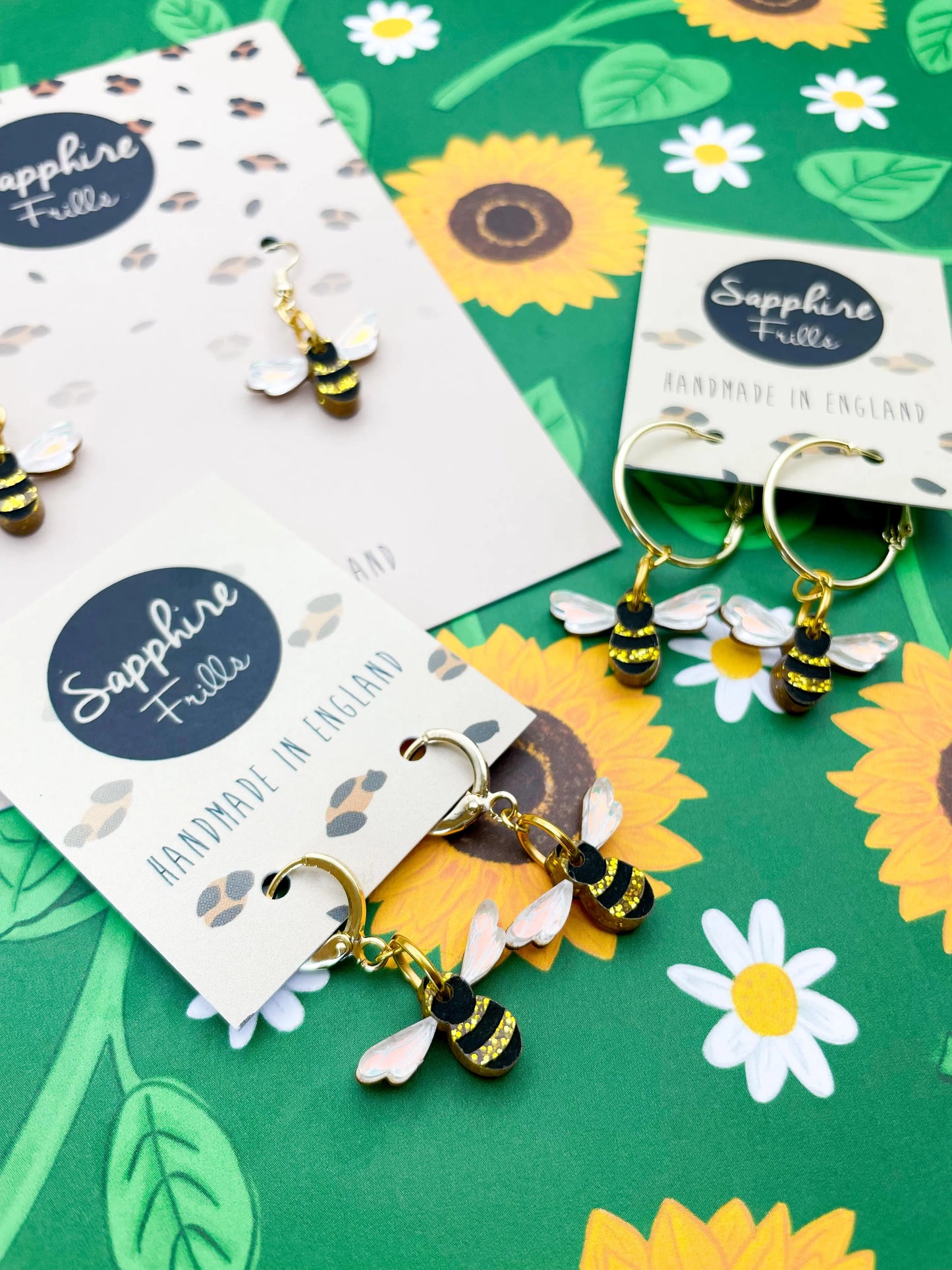 Small Gold Glitter and Iridescent Blue Acrylic Bee Dangle Earrings from Sapphire Frills