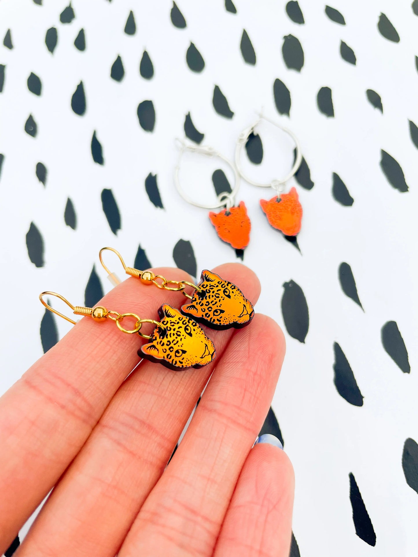 Small Iridescent Orange and Green Acrylic Leopard Face Dangle Earrings from Sapphire Frills