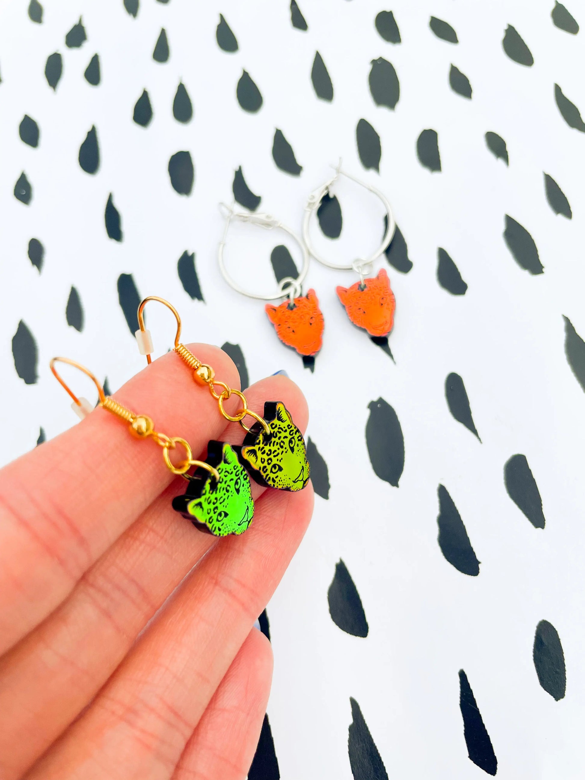 Small Iridescent Orange and Green Acrylic Leopard Face Dangle Earrings from Sapphire Frills