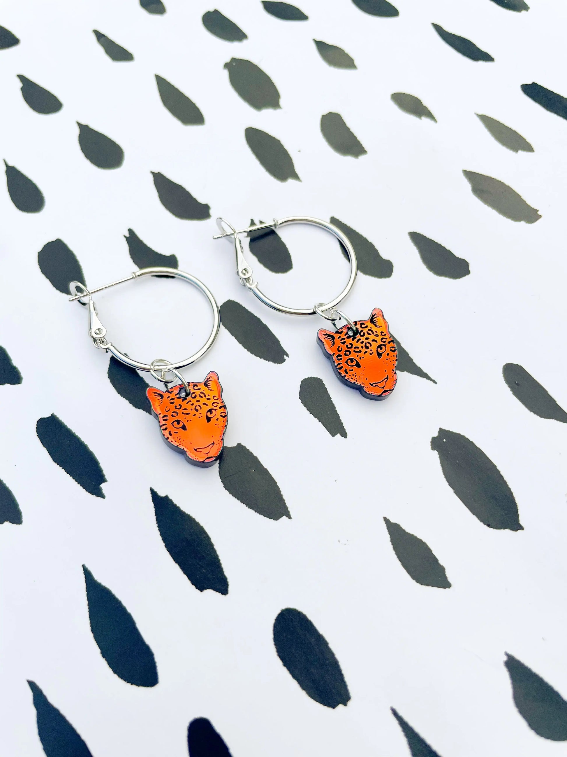 Small Iridescent Orange and Green Acrylic Leopard Face Dangle Earrings from Sapphire Frills