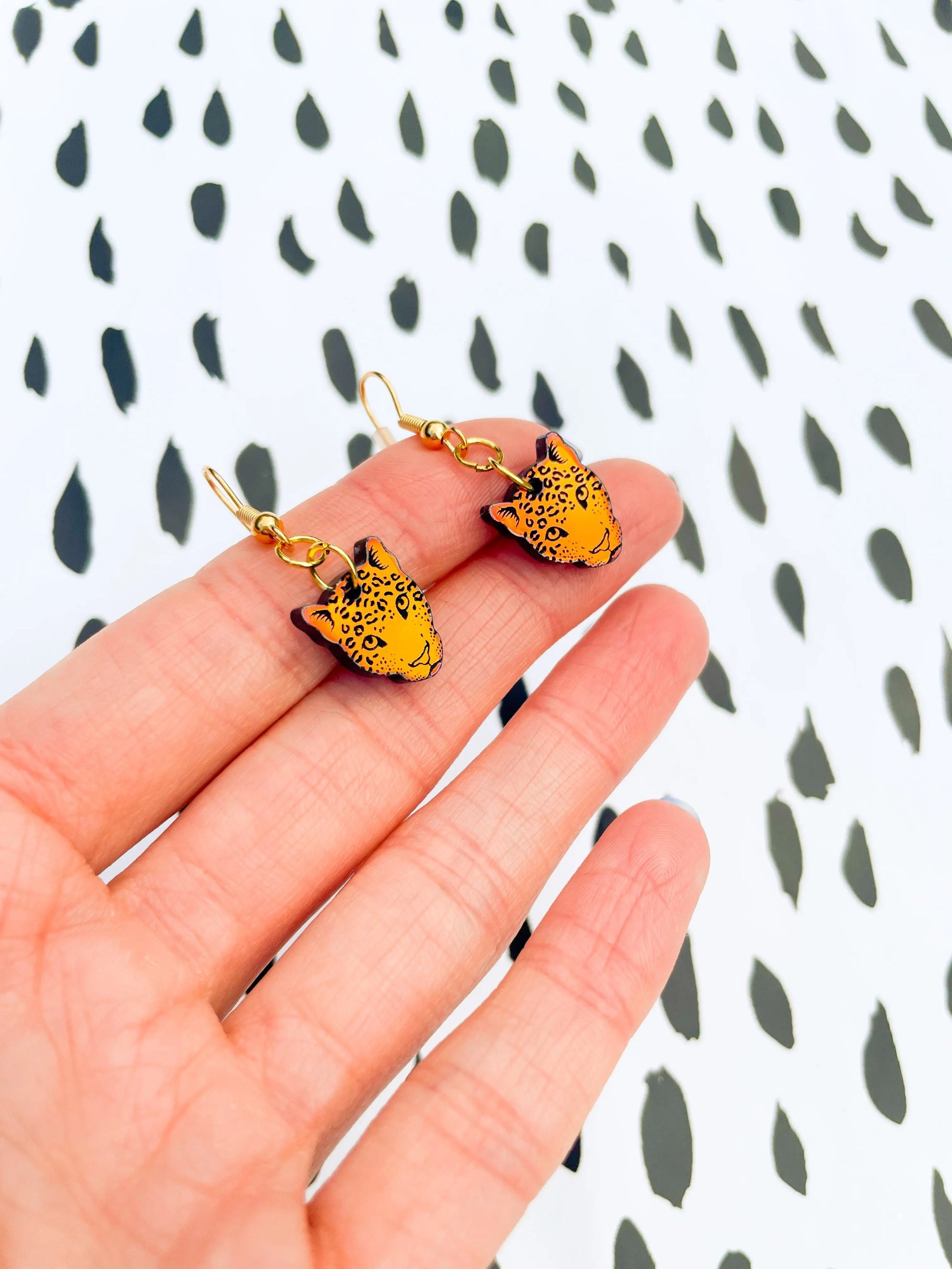 Small Iridescent Orange and Green Acrylic Leopard Face Dangle Earrings from Sapphire Frills