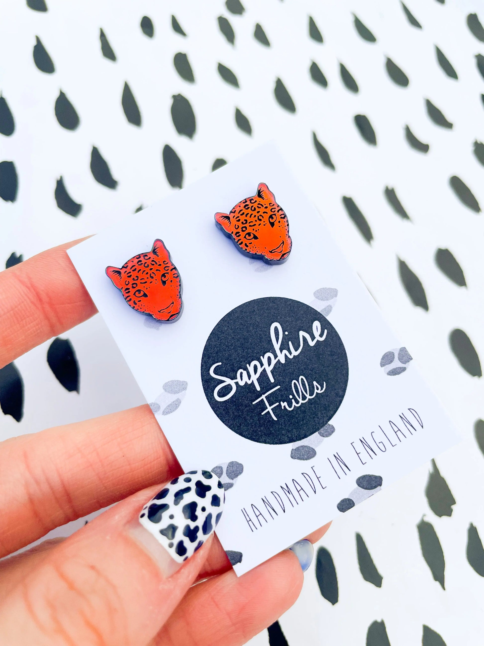 Small Iridescent Orange and Green Acrylic Leopard Face Stud Earrings from Sapphire Frills