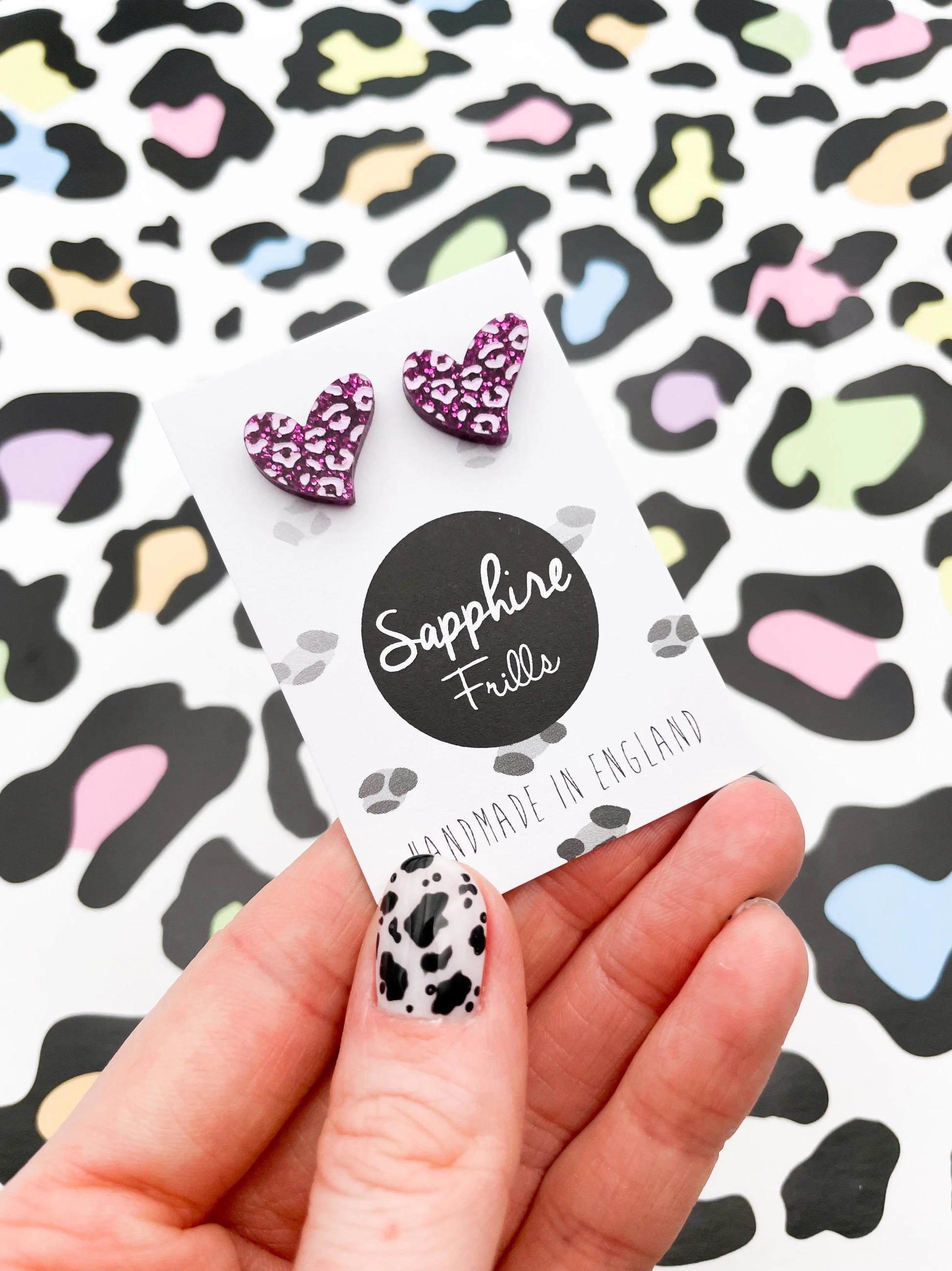 Small Purple Glitter Leopard Print Acrylic Heart Studs from Sapphire Frills