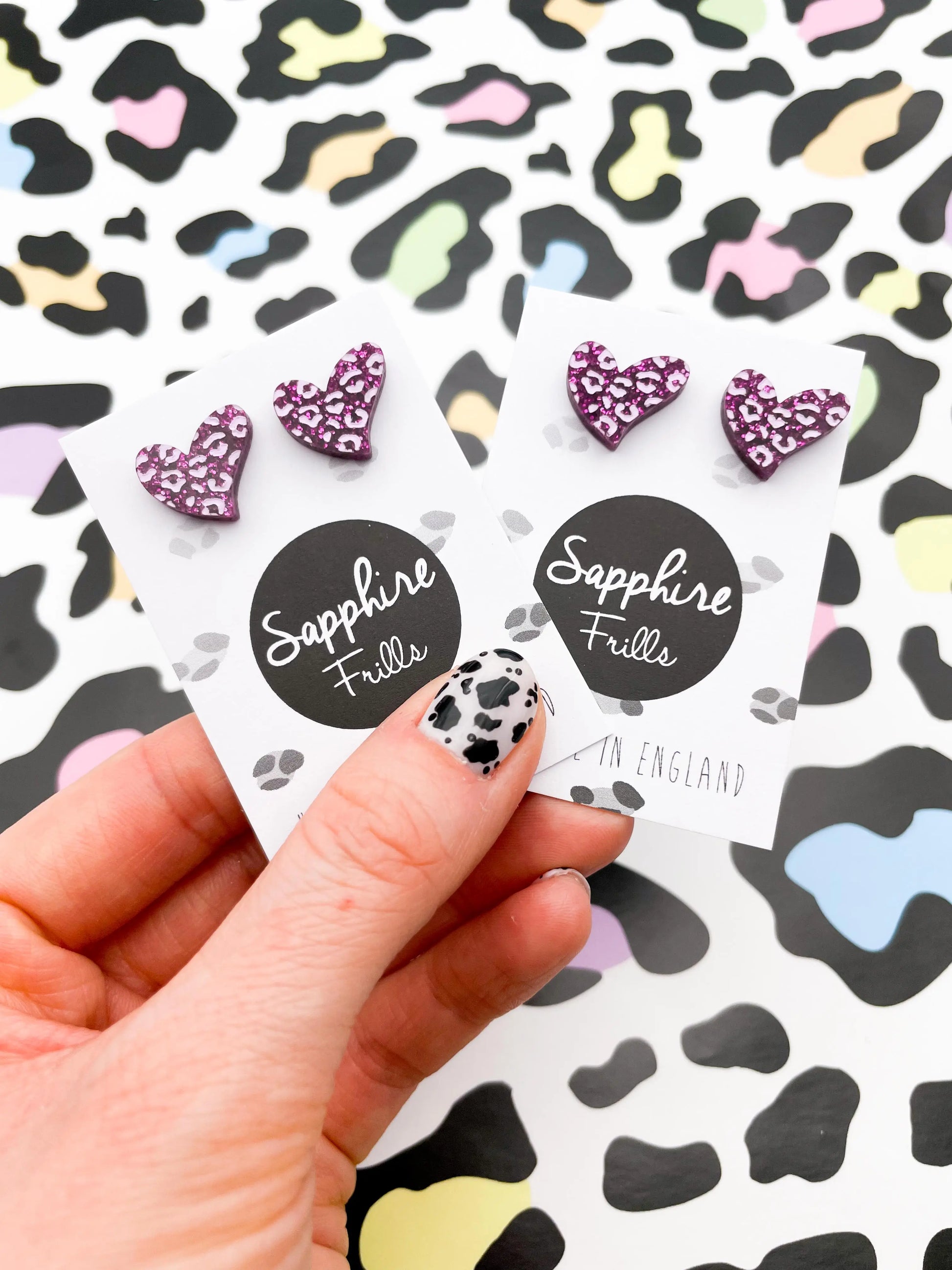 Small Purple Glitter Leopard Print Acrylic Heart Studs from Sapphire Frills