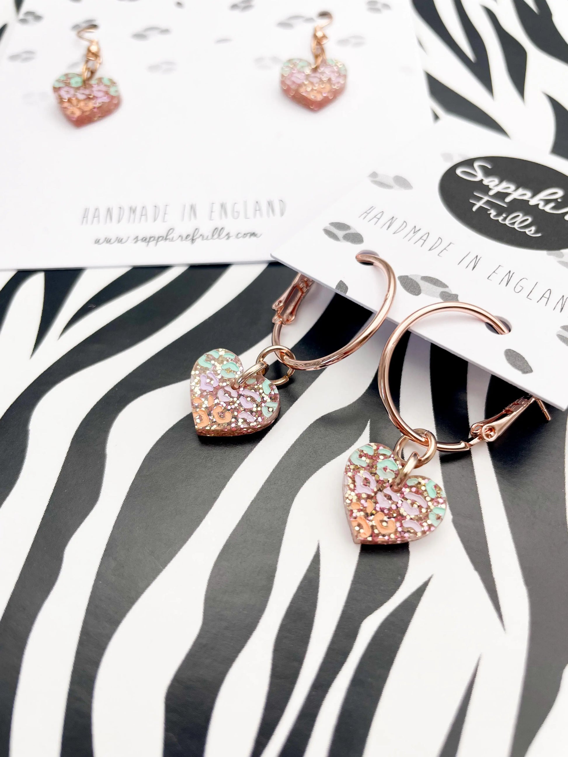 Small Rose Glitter, Mint, Lilac and Peach Leopard Print Acrylic Heart Dangle Earrings from Sapphire Frills