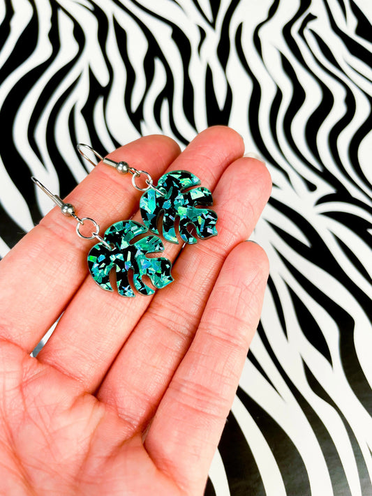 Small Teal Chunky Crystal Glitter Acrylic Monstera Leaf Dangle Earrings from Sapphire Frills