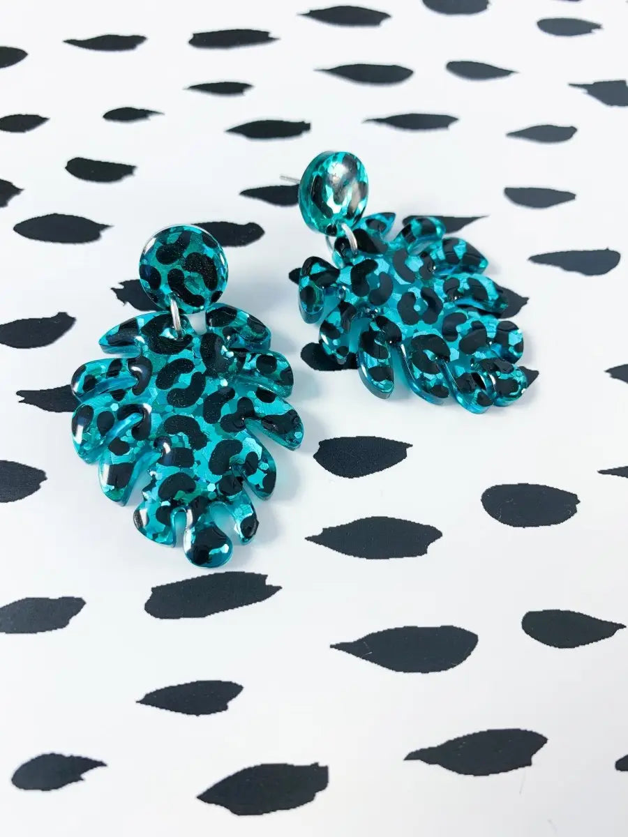 Teal Glitter Leopard Print Monstera Leaf Dangle Earrings from Sapphire Frills